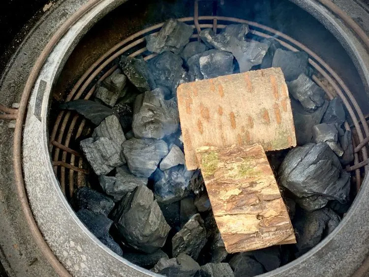 Wood chunks added to the charcoal
